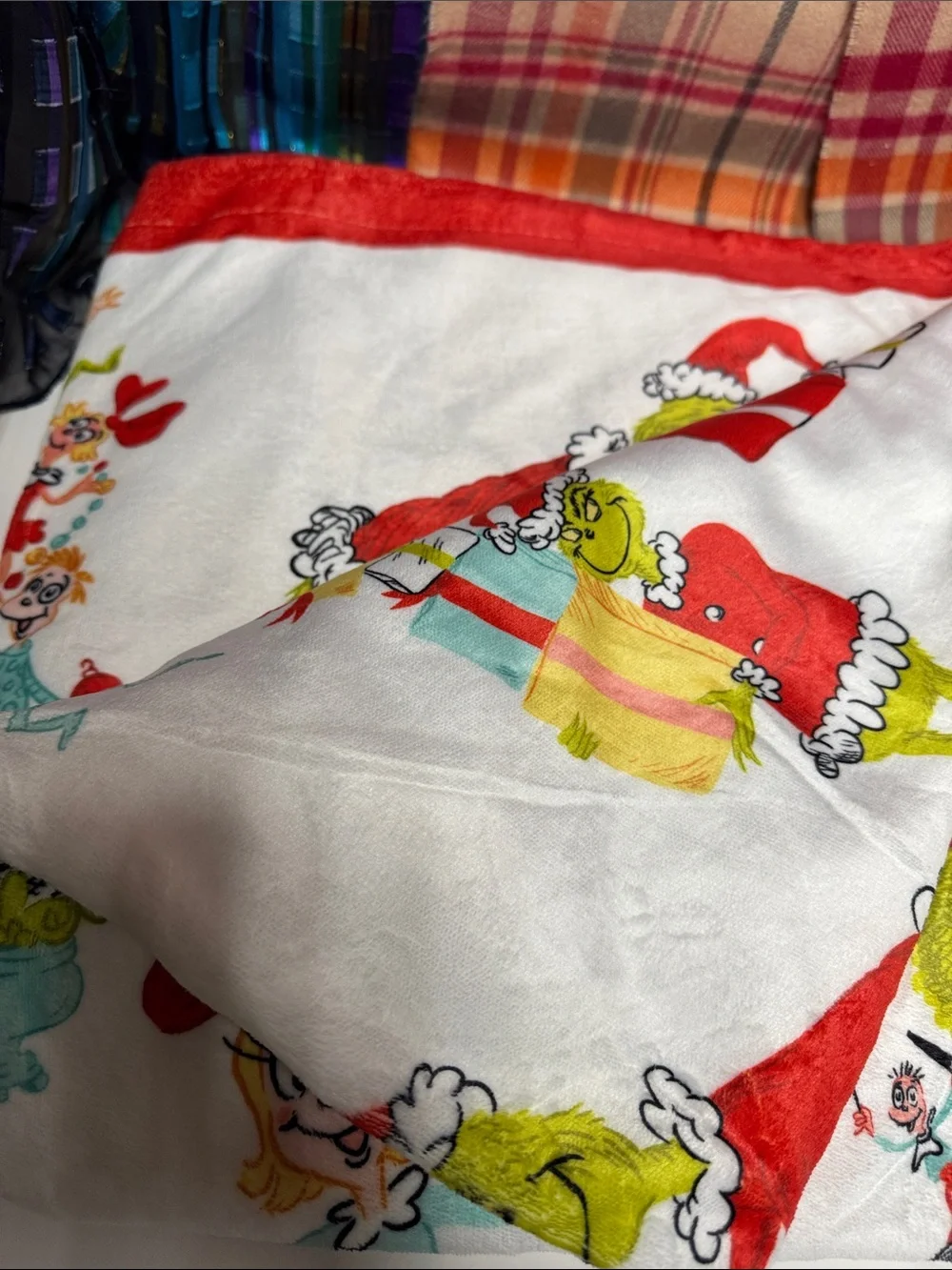 Hallmark Grinch Holiday Blanket in Red, White, Green and Tan